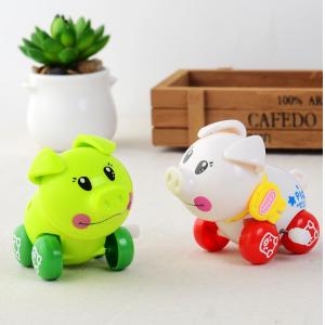 China 5cm high Cheap Christmas toy for children white green wind up pig supplier