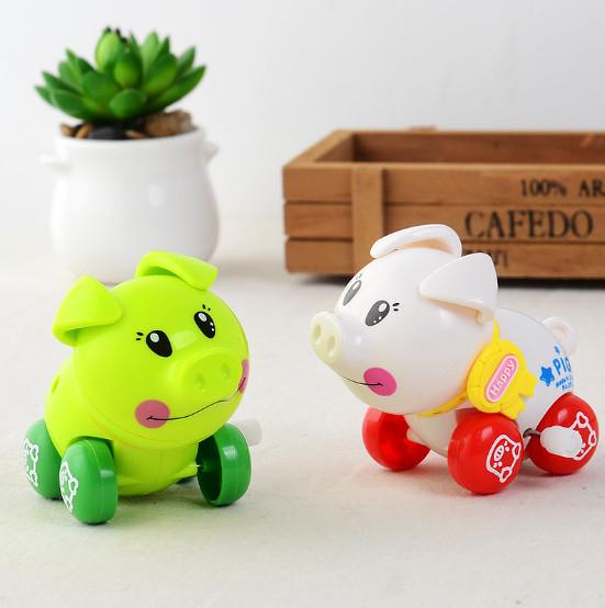 5cm high Cheap Christmas toy for children white green wind up pig