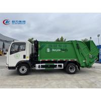 China 140HP 6m3/6000liters/6cbm Howo RHD Rear Load Garbage Truck Waste Collector Truck on sale